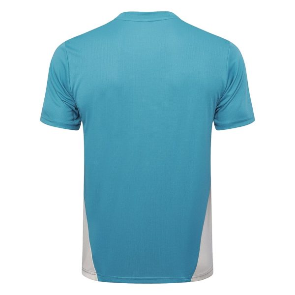Conjunto de camiseta y pantalones cortos verde OM 2024 2025