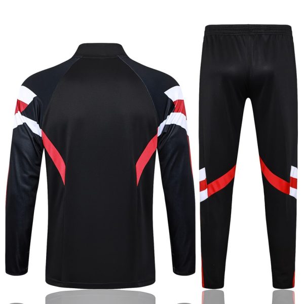 Chándal de entrenamiento del Manchester United 2024-2025 negro y rojo